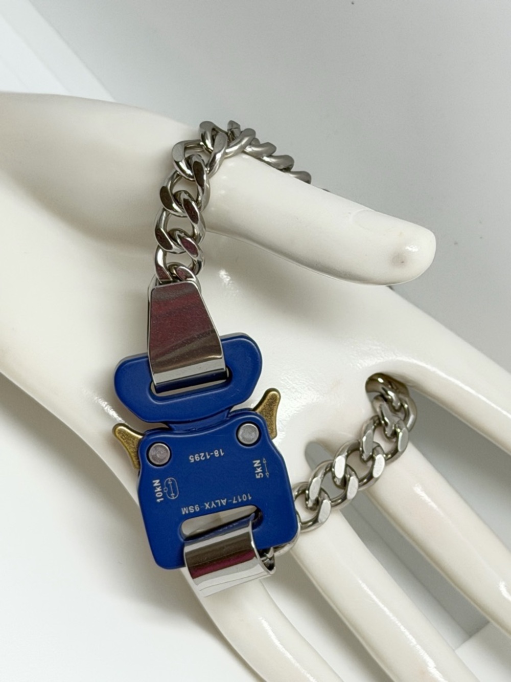 Chunky Silver Chain Bracelet with Blue Buckle Detail